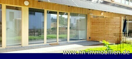 Gebäudeansicht - Außenansicht - Wohnung im Erdgeschoss Gebäudeansicht - Außenansicht - Wohnung im Erdgeschoss